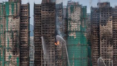Smoke rises from apartments after a major fire swept through several blocks