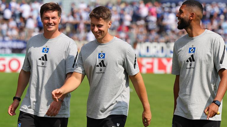 Trainer Merlin Polzin, Co-Trainer Loic Fave und Co-Trainer Richard Krohn