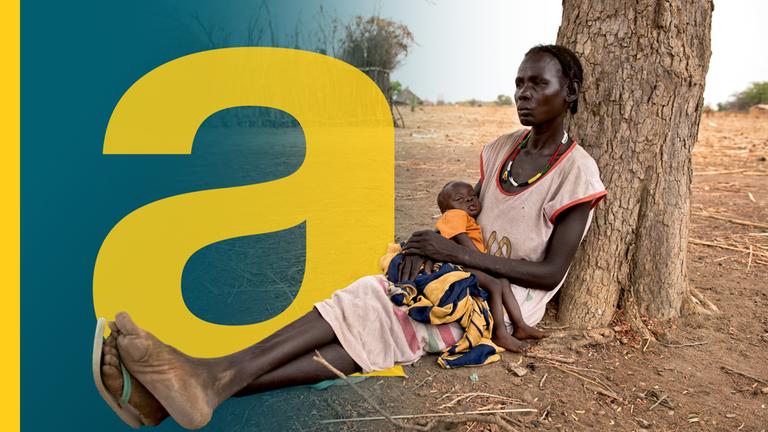 Von Hungersnot betroffene Mutter hält ihren Sohn im Arm