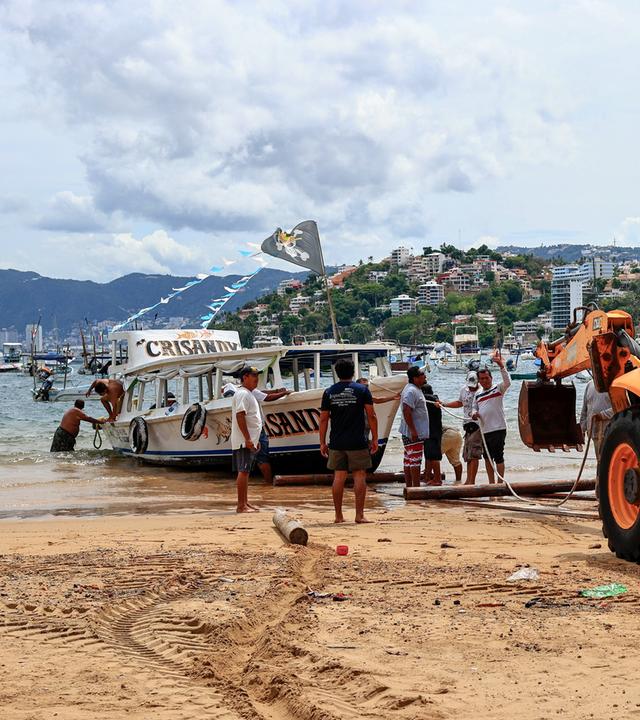 People prepare for Hurricane Polo in Acapulco