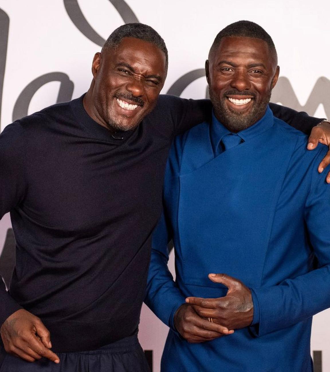 Idris Elba posiert neben seiner Wachsfigur