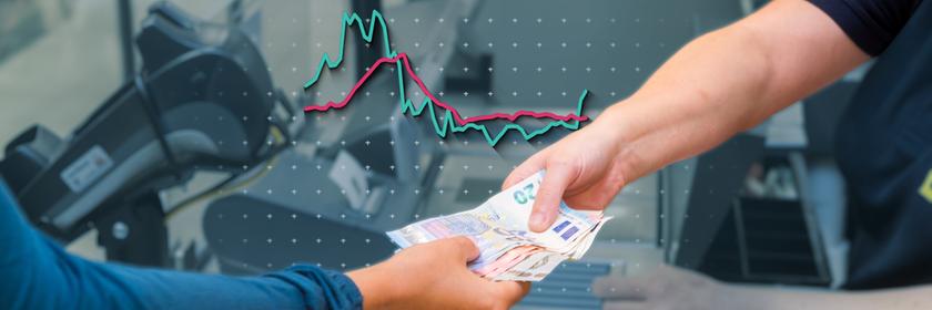 An der Supermarktkasse wird ein Einkauf bezahlt, dahinter eine Grafik zum Verlauf der Inflation