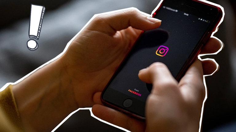 Instagram-App auf Handy mit Ausrufezeichen