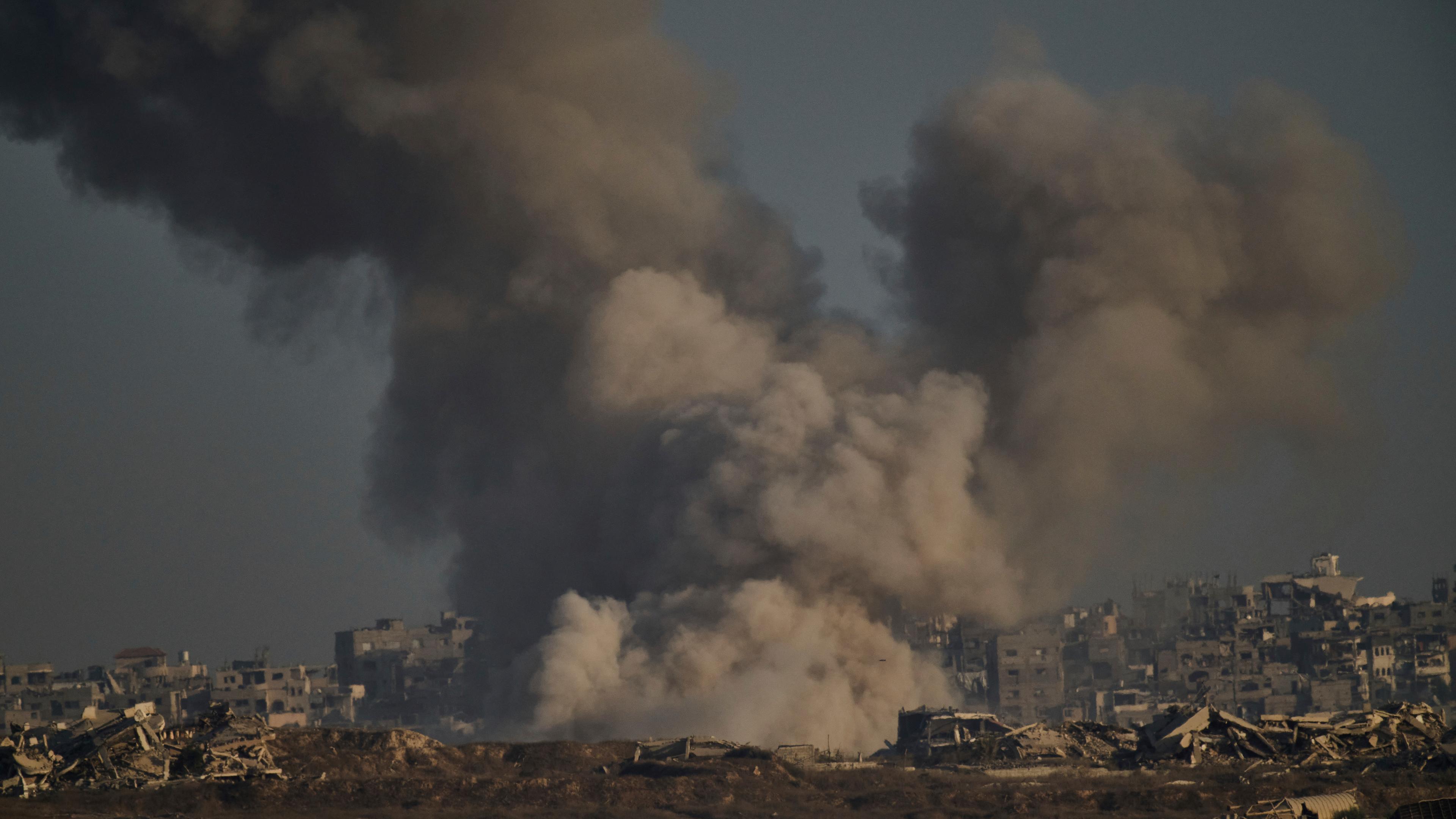 Smoke rises to the sky following an Israeli military strike in the northern Gaza Strip, as seen from southern Israel, Saturday