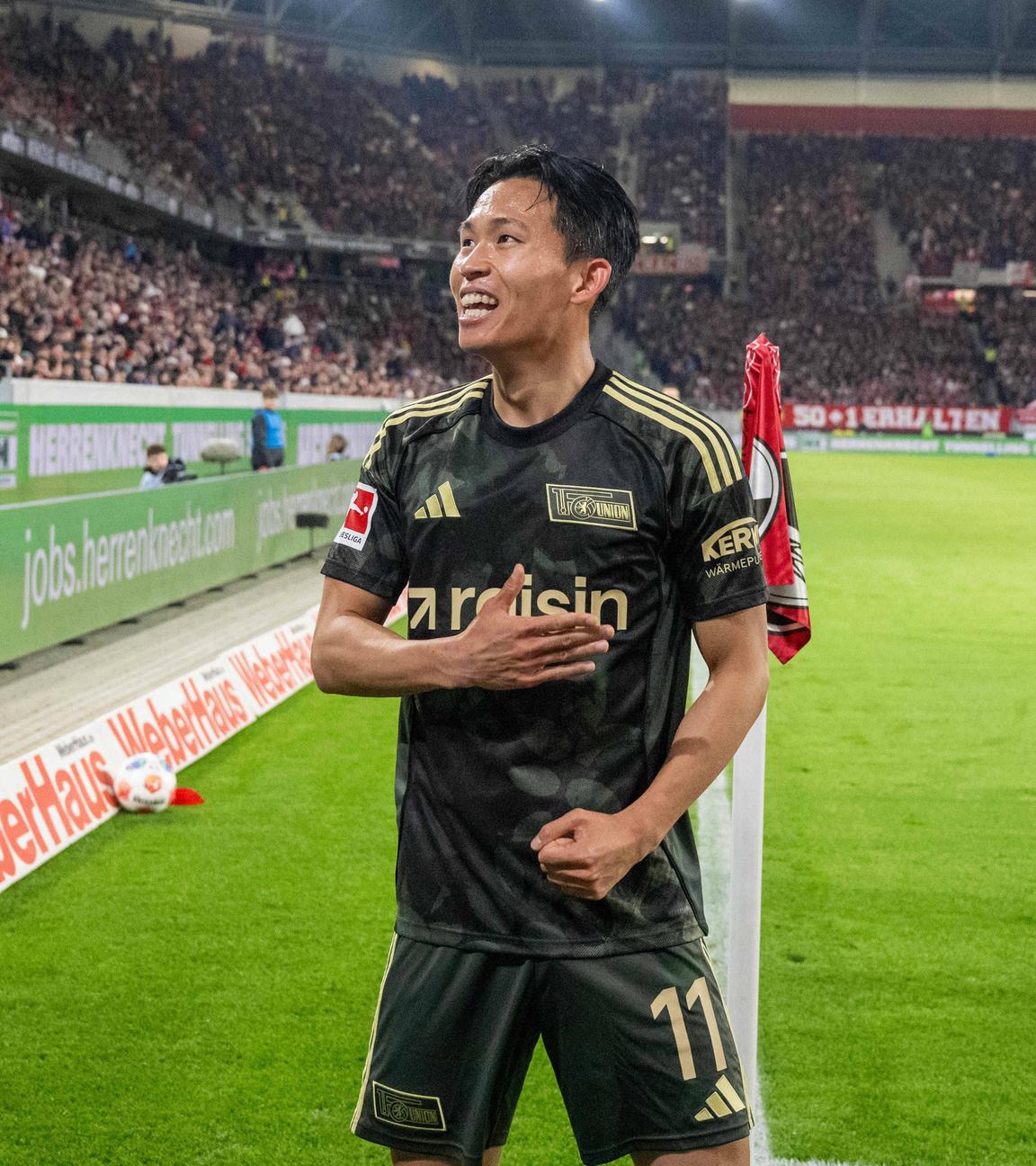 Jeong Woo-yeong jubelt nach seinem Tor zum 0:1 am 15.03.2026 in Freiburg.