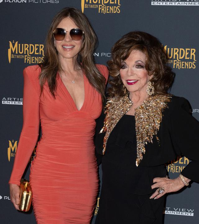 Joan Collins strahlt bei Filmpremiere