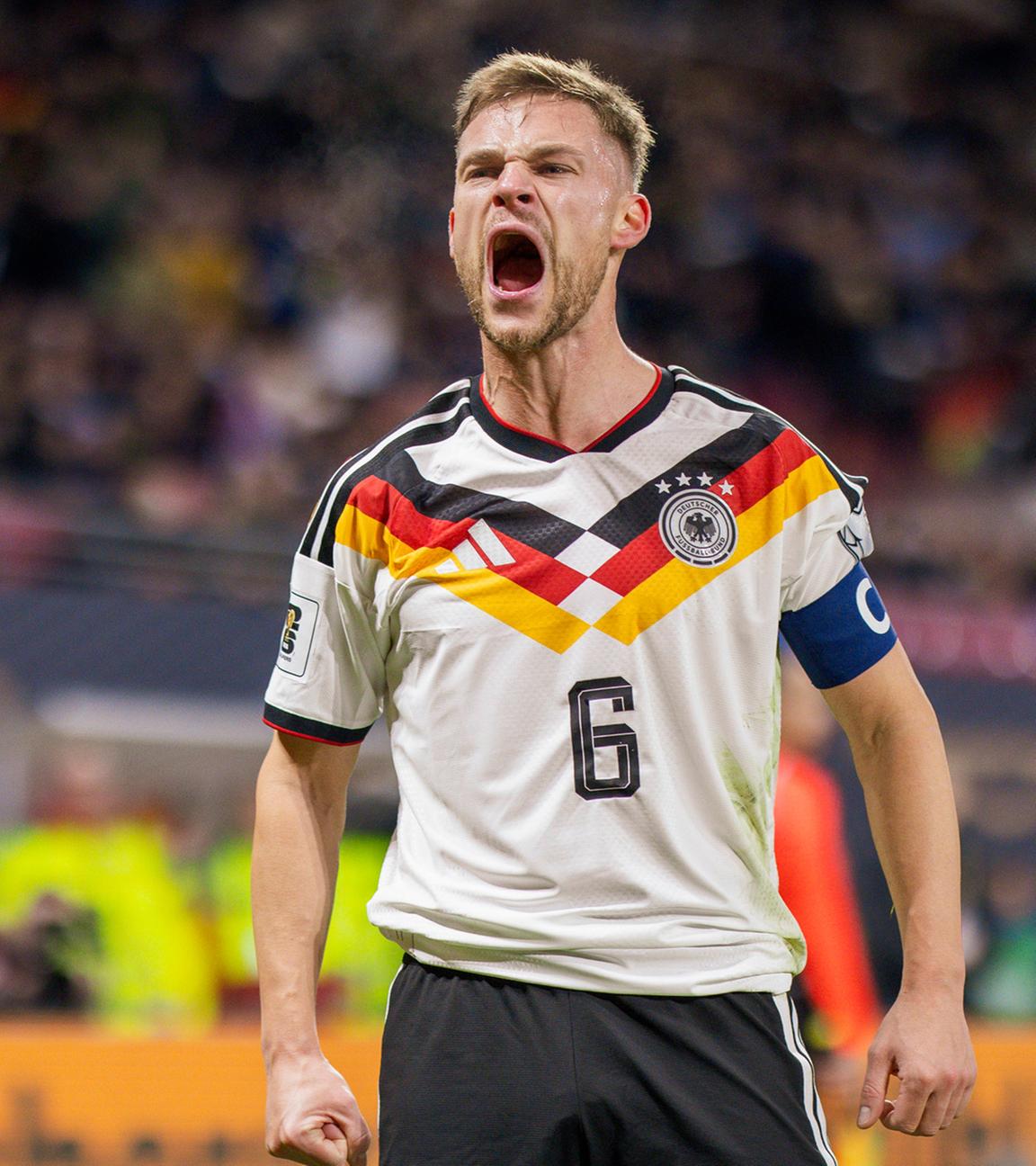 Joshua Kimmich feiert ein Tor für Deutschland gegen die Slowakei.