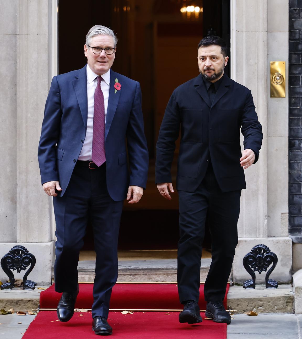Ukraine's President Volodymyr Zelensky (R) and British Prime Minister Keir Starmer leave Downing Street, London.