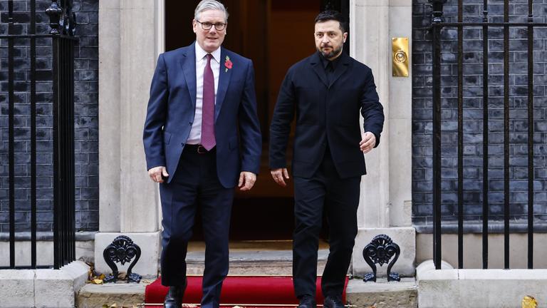 Ukraine's President Volodymyr Zelensky (R) and British Prime Minister Keir Starmer leave Downing Street, London.