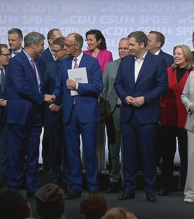 SPD und Unions-Politiker posieren für ein Foto