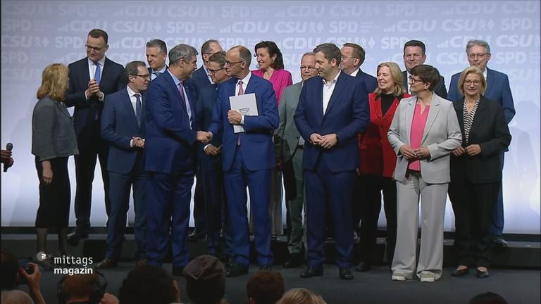 SPD und Unions-Politiker posieren für ein Foto