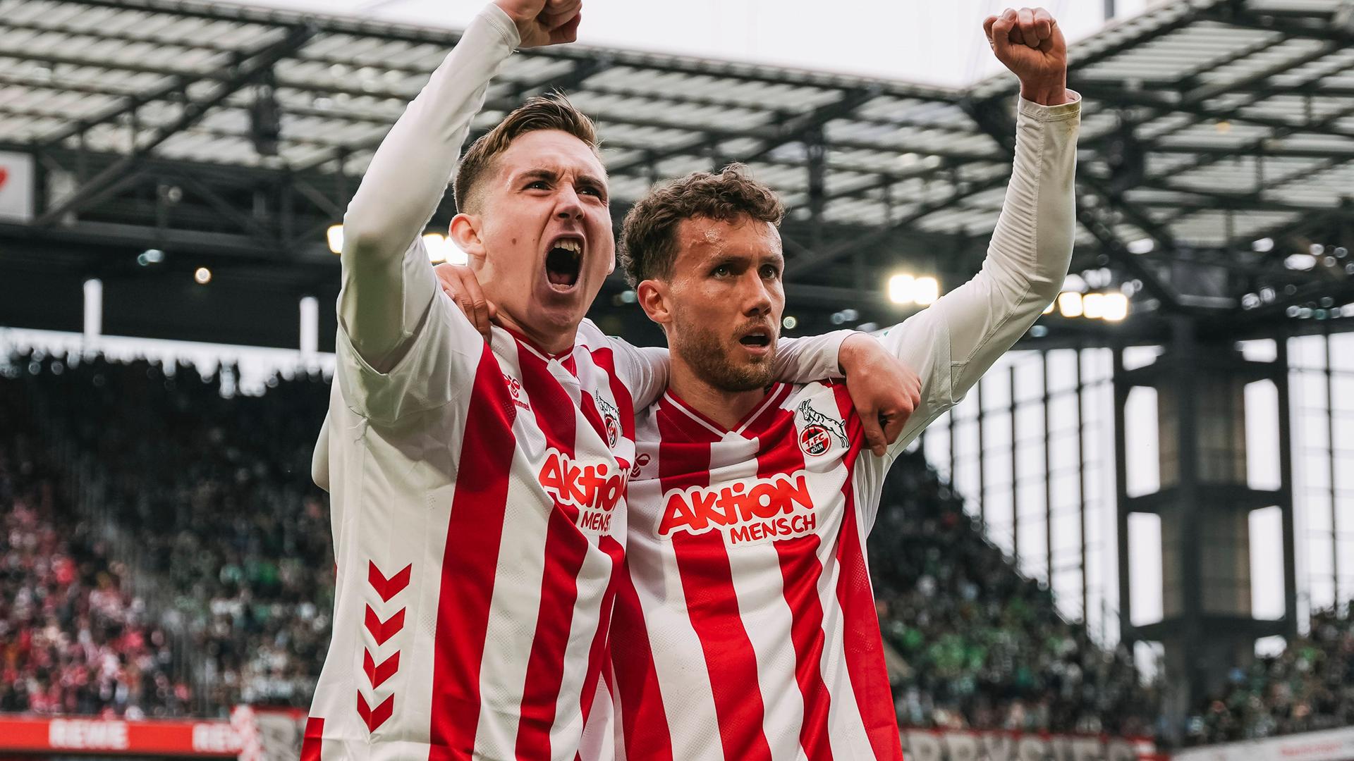 Isak Bergmann Johannesson und Luca Waldschmidt (FC Köln) jubeln. 