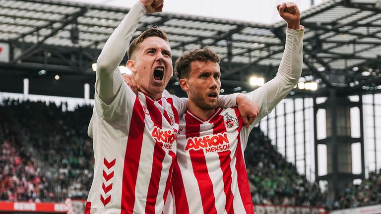 Isak Bergmann Johannesson und Luca Waldschmidt (FC Köln) jubeln. 