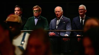 Britain's King Charles listens along side British singer-songwriter Elton John during a music workshop for young people, at Battersea Power Station in south west London, Wednesday.