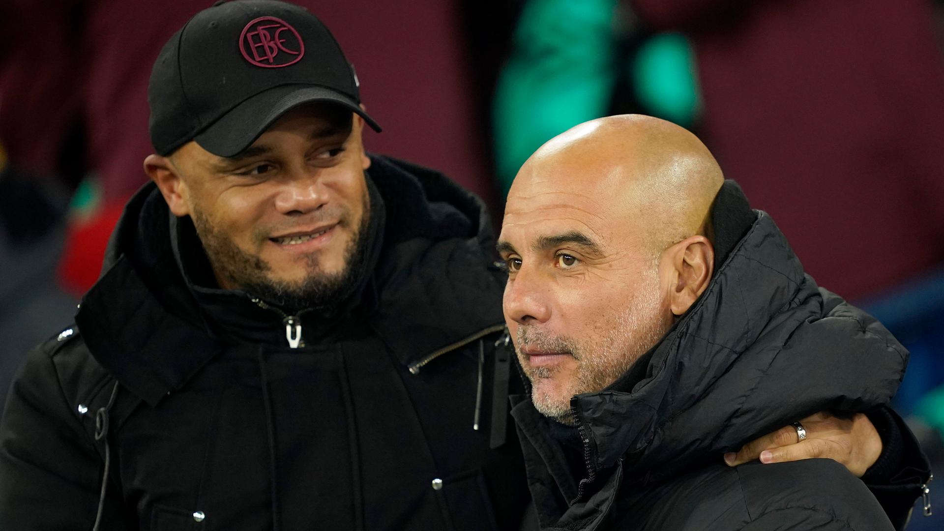 Einst Spieler und Trainer, nun Trainerkollegen: Vincent Kompany (l.) und Pep Guardiola