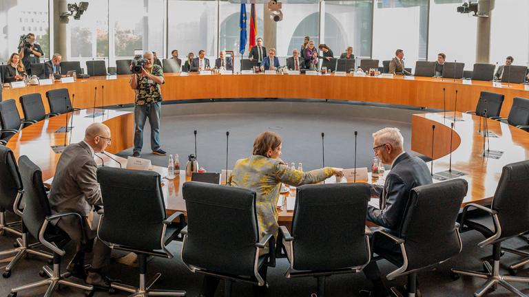 (R-L) President of the Federal Intelligence Service (BND), Martin Jaeger, Head of the Office for the Protection of the Constitution, Sinan Selen and president of the Military Counterintelligence Service (MAD), Martina Rosenberg wait ahead a hearing by a Bundestag oversight committee in Berlin, on October 13, 2025.