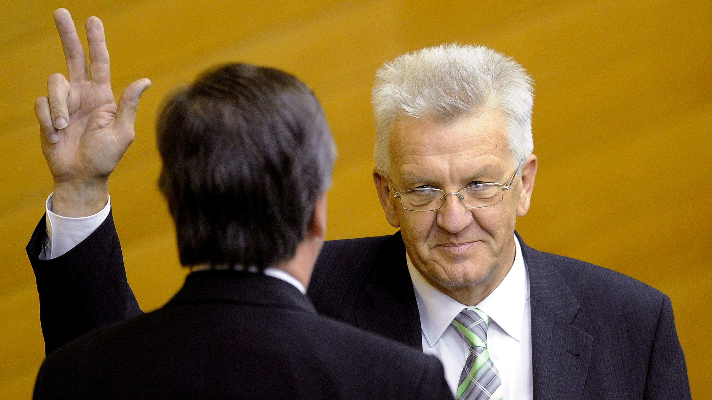 Winfried Kretschmann wird 2011 in Stuttgart als erster grüner Ministerpräsident vereidigt