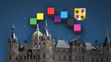 Landtag in Schwerin, Würfel in Parteifarben und das Wappen von Mecklenburg-Vorpommern