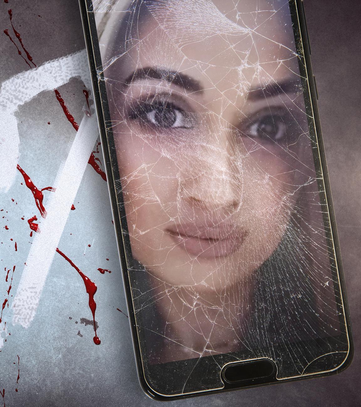 Ein Porträtfoto der ermordeten Nadine Lott hängt mit einer Klammer an einer Leine.