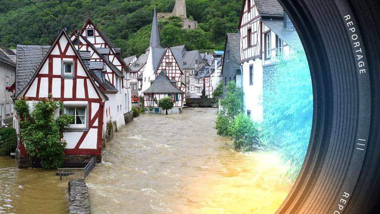 Eine kleine Straße mit weiß-roten Fachwerkhäusern am Straßenrand. Die Straße ist bedeckt mit braunem unruhigen Wasser.