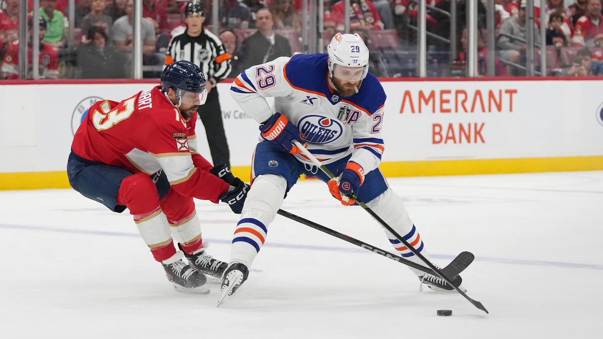 Florida PanthersSam Reinhart (13) and Edmonton Oilers center Leon Draisaitl 