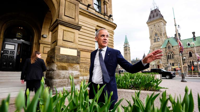  Prime Minister Mark Carney arrives at the Office of the Prime Minister and Privy Council, the morning after the Liberal Party won the Canadian federal election