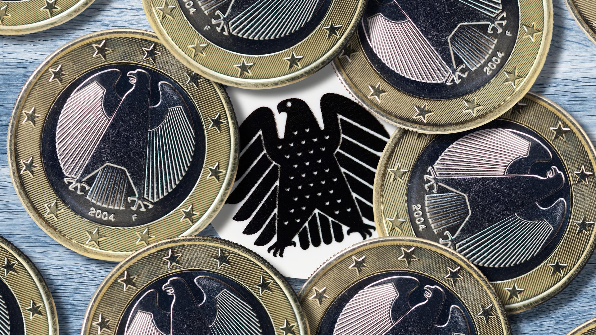 Euromünzen und Bundesadler, Symbolfoto Lobbyismus