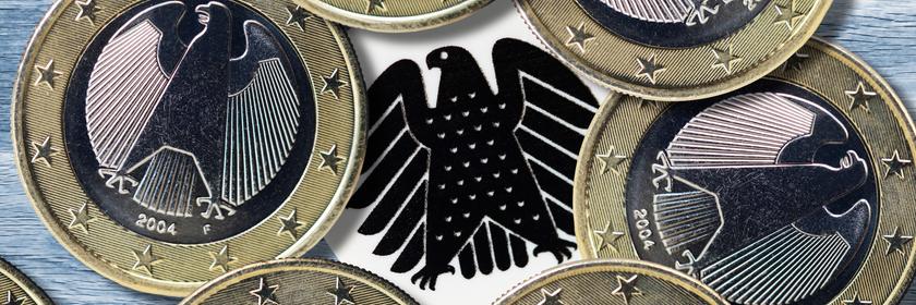 Euromünzen und Bundesadler, Symbolfoto Lobbyismus