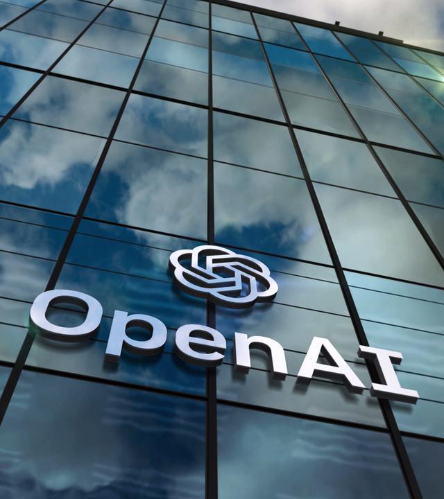 Das Logo von OpenAI an der Fassade des Hauptquartiers.