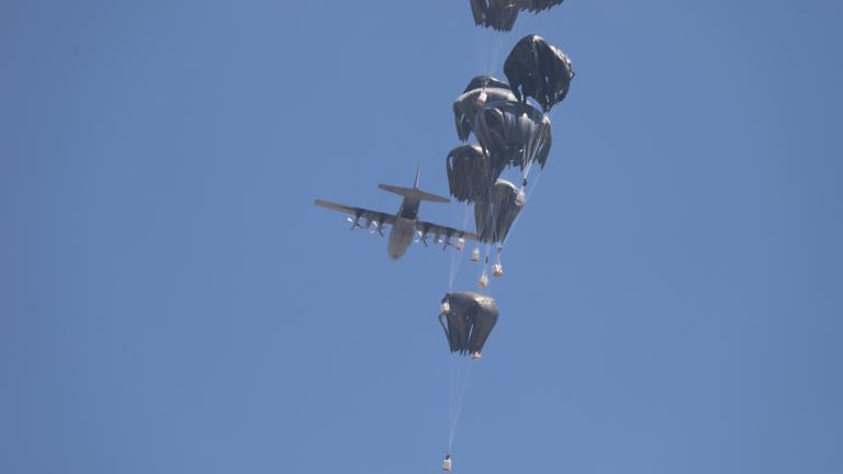 July 27, 2025, Gaza City, Gaza Strip, Palestinian Territory: An airplane drops humanitarian aid over Gaza as seen from northern Gaza Strip July 27, 2025 
