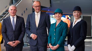 ermany's Chancellor Friedrich Merz (2-L) and Lufthansa CEO Carsten Spohr (L) attend a ceremony marking Lufthansa's 100th anniversary in Frankfurt am Main, Germany, 15 April 2026.