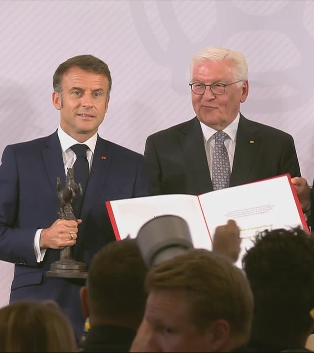 Macron erhält den westfälischen Friedenspreis in Münster.