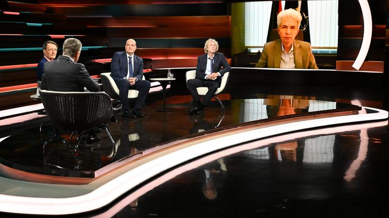 Karl Lauterbach, Robin Alexander, Bernd Raffelhüschen und Schalte: Marie-Agnes Strack-Zimmermann bei "Markus Lanz".