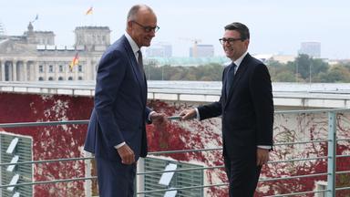 Friedrich Merz und Andy Burnham