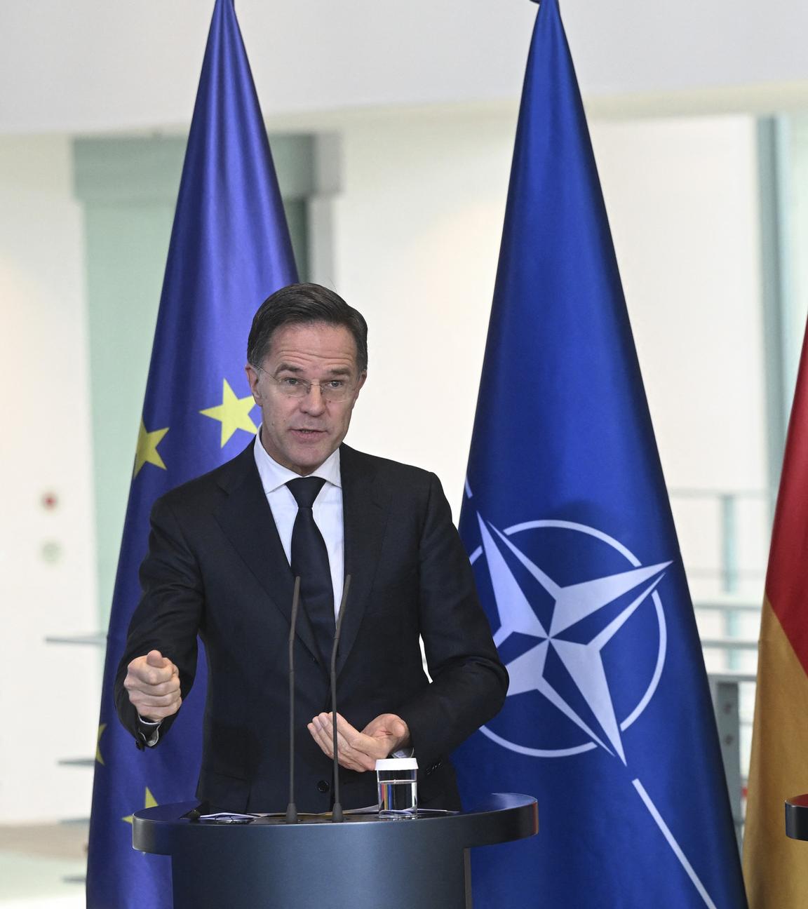 NATO Secretary General Mark Rutte (L) and German Chancellor Friedrich Merz (R) hold a press conference at Prime Minister s Office in Berlin