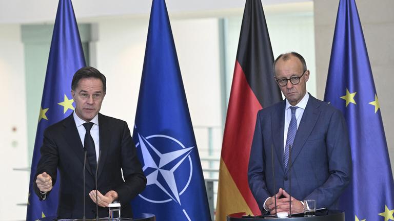 NATO Secretary General Mark Rutte (L) and German Chancellor Friedrich Merz (R) hold a press conference at Prime Minister s Office in Berlin