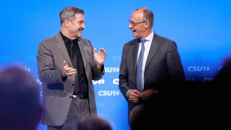 Markus Söder und Friedrich Merz (r)
