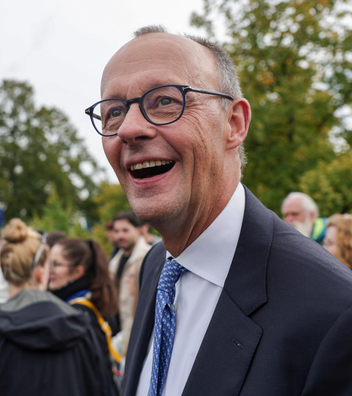 German Chancellor Friedrich Merz reacts during a tour after celebrations for the Day of German Unity 2025 in Saarbruecken