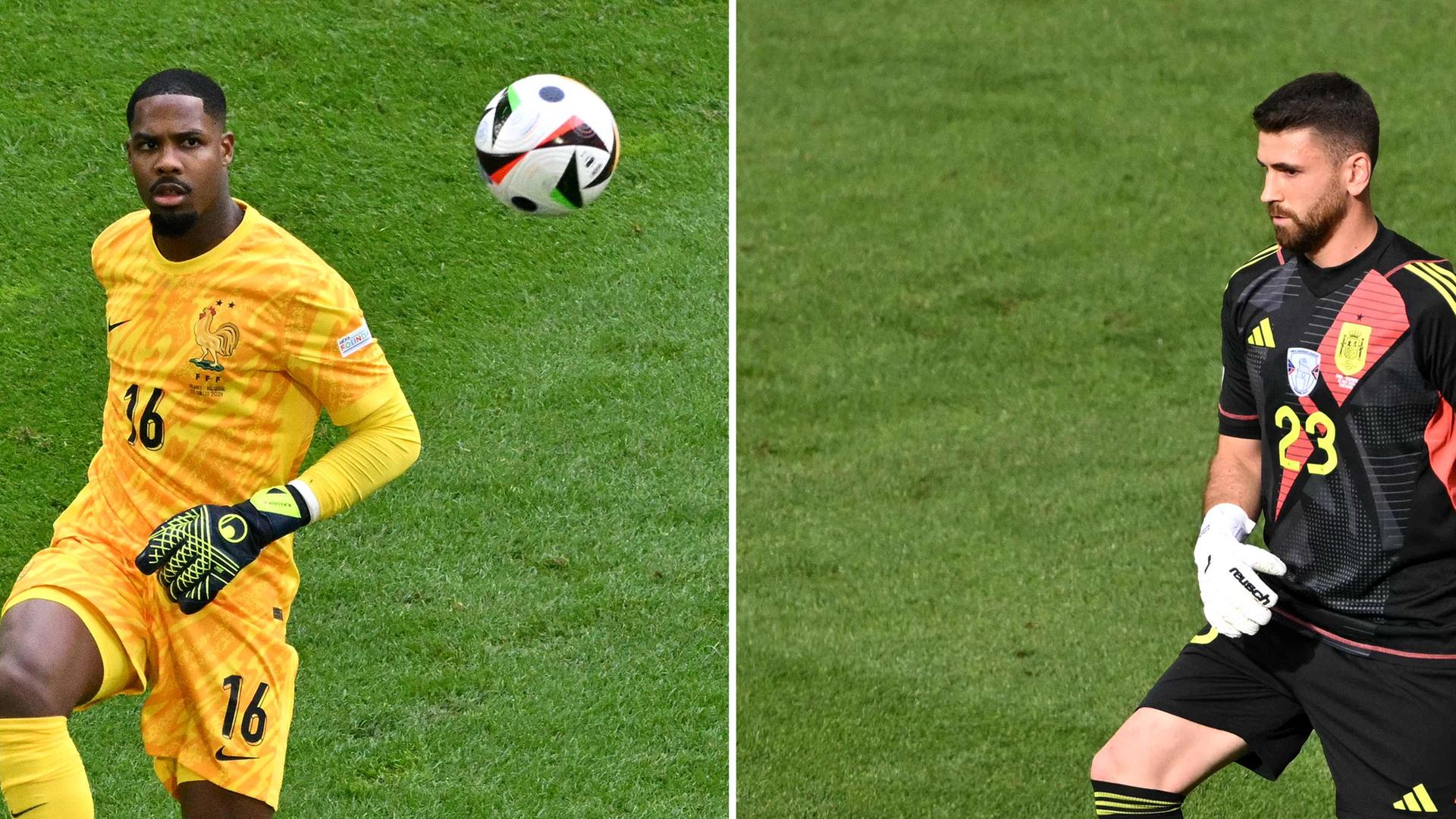 Frankreichs Torwart Mike Maignan (l) und Spaniens Torwart Unai Simon