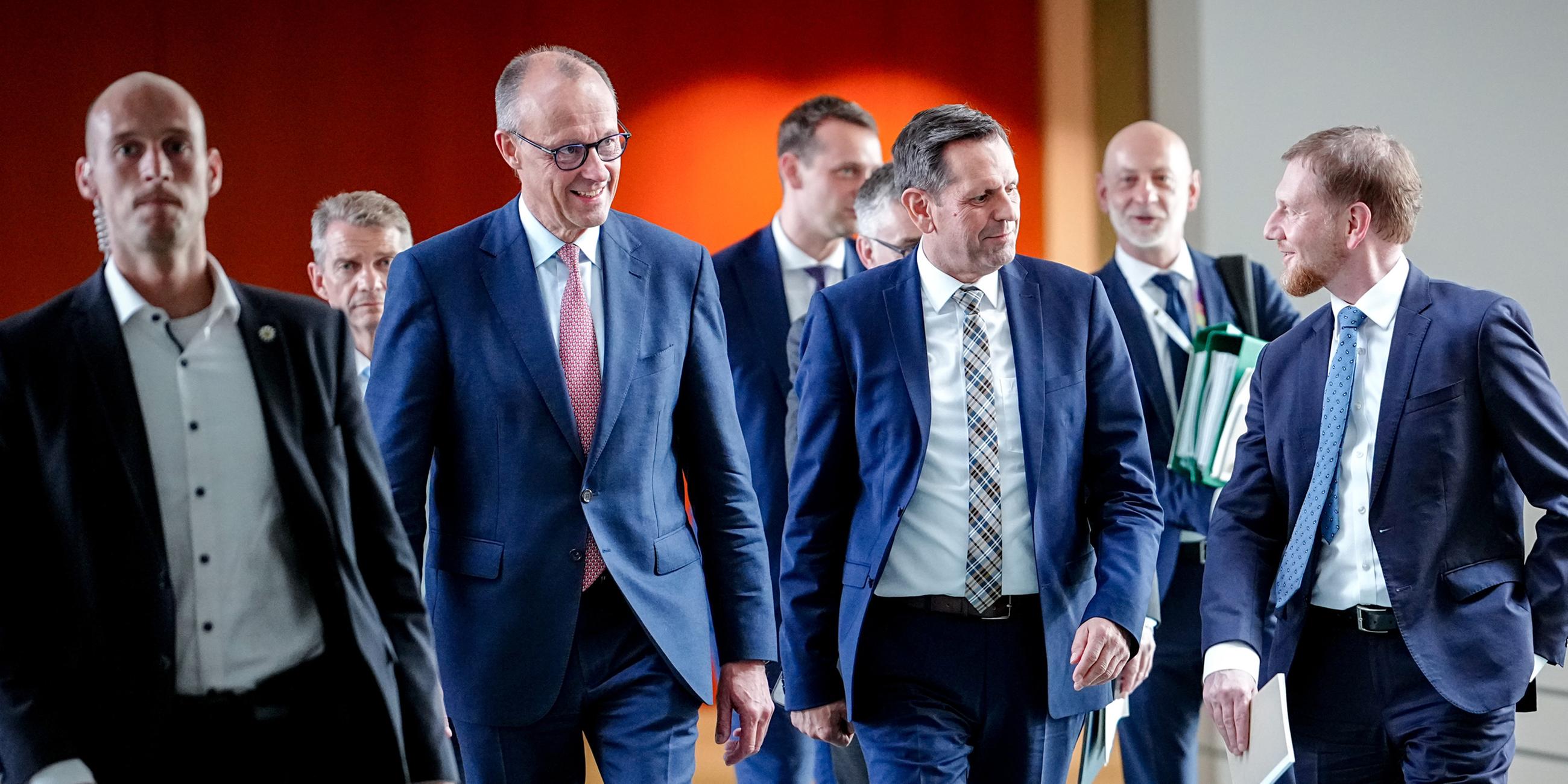 Friedrich Merz, Olaf Lies und Michael Kretschmer am 18.06.2025 in Berlin