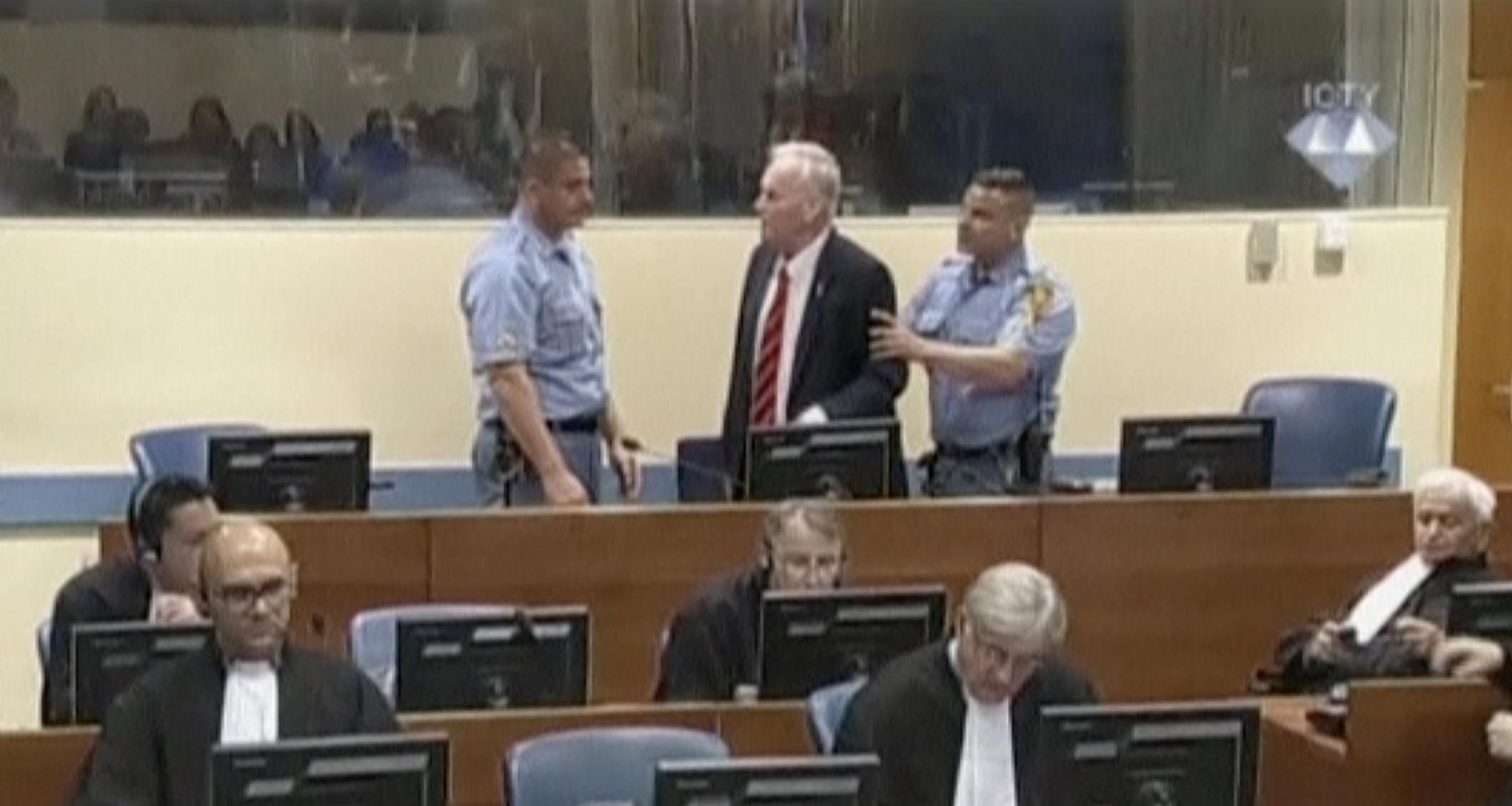 ex-bosnian serb wartime general ratko mladic reacts in court at the international criminal tribunal for the former yugoslavia in