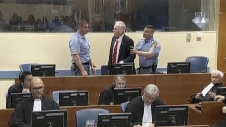 ex-bosnian serb wartime general ratko mladic reacts in court at the international criminal tribunal for the former yugoslavia in