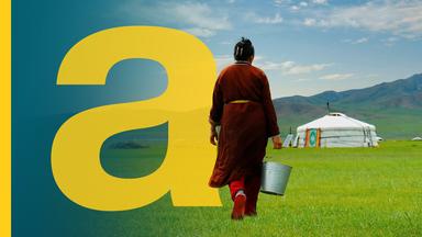 Eine Frau in einer mongolischen Steppe