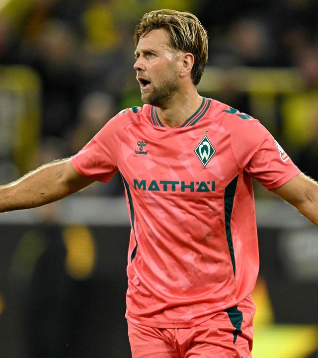 Werder Bremens Stürmer Niclas Füllkrug reagiert während der Bundesliga-Partie gegen Borussia Dortmund.