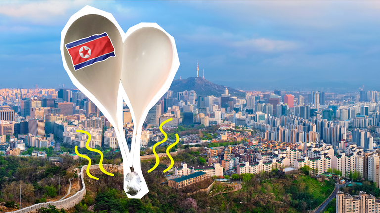 Abfallballons mit nordkoreanischer Flagge und im Hintergrund eine Sicht auf Seoul