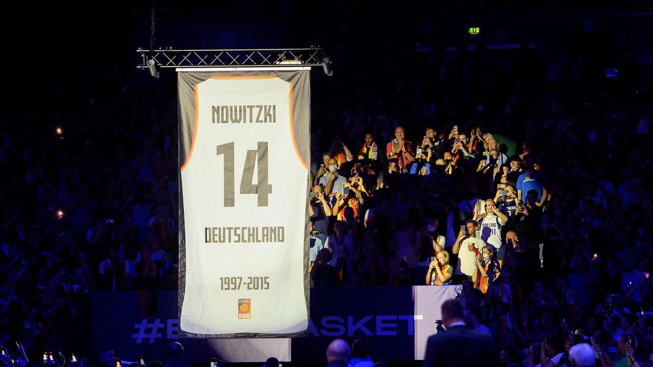 Dirk Nowitzki's number 14 jersey being retired.