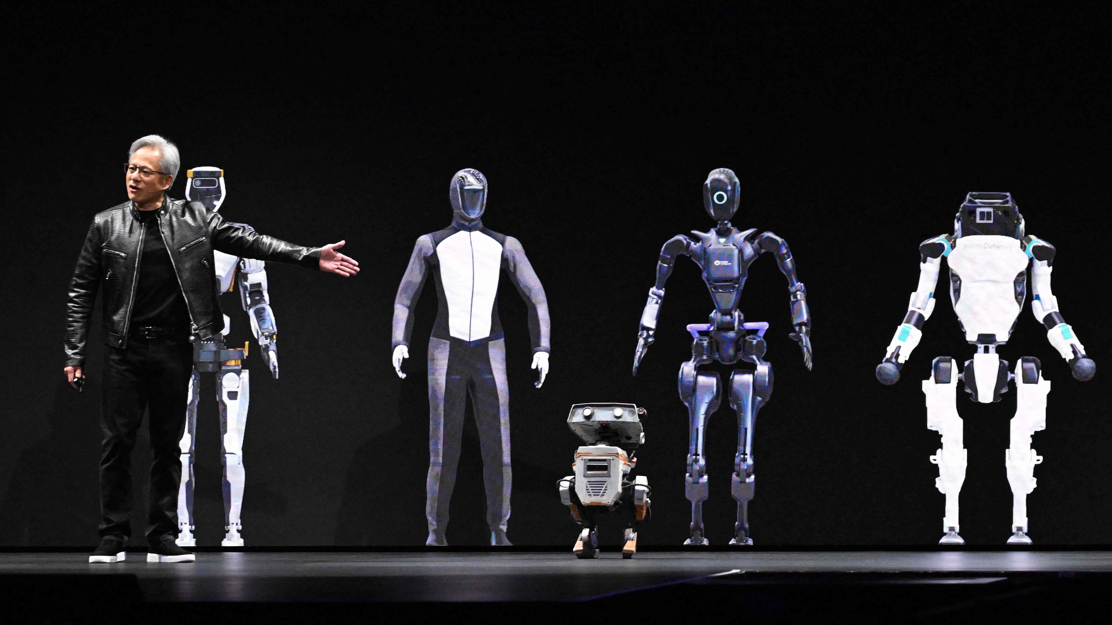 NVIDIA's CEO Jensen Huang zeigt Produkte auf der Bühne während der jährlichen Nvidia GTC Artificial Intelligence Conference im SAP Center in San Jose, aufgenommen am 18.03.2024