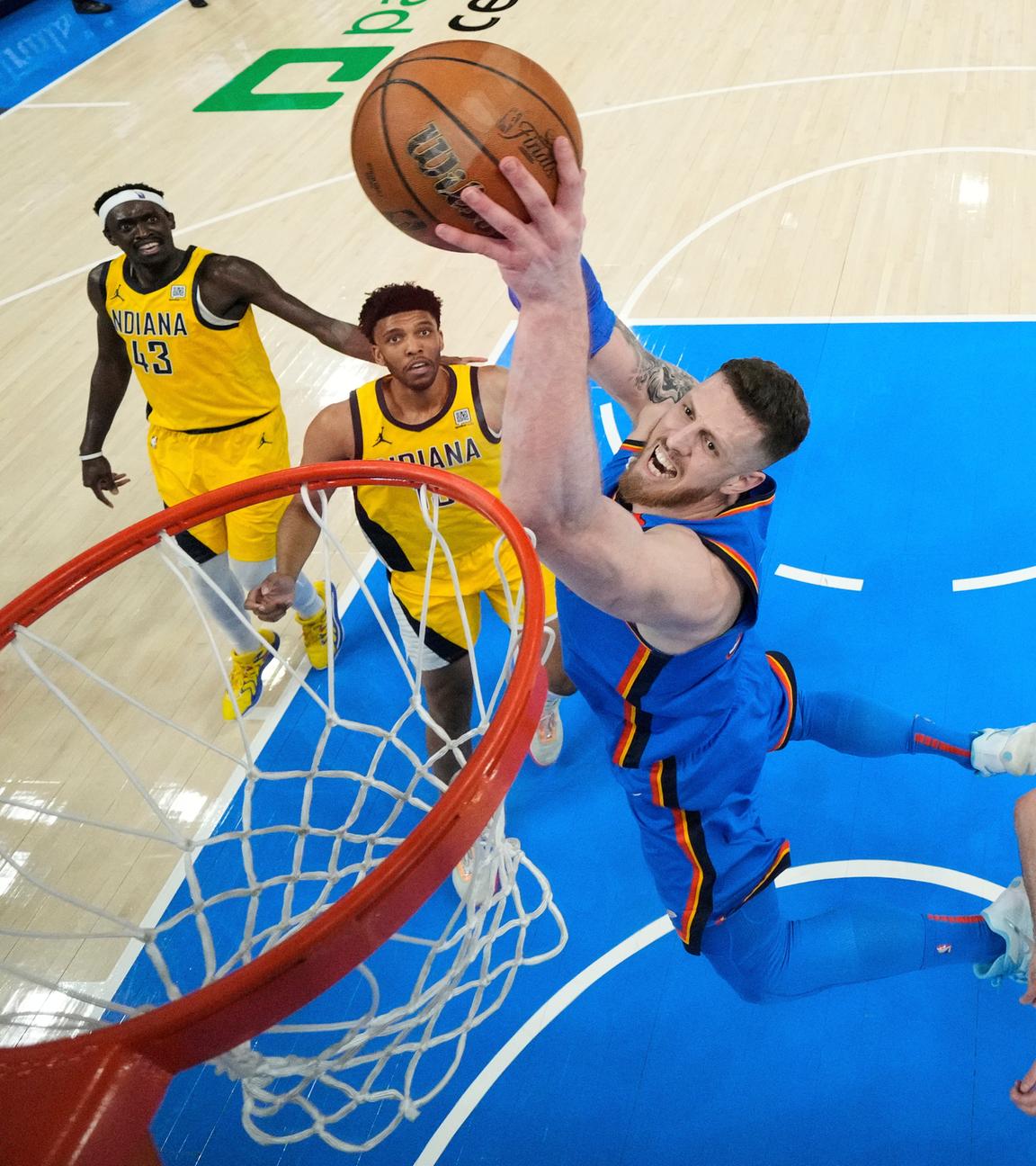 Oklahoma City Thunder center Isaiah Hartenstein drives to the basket -