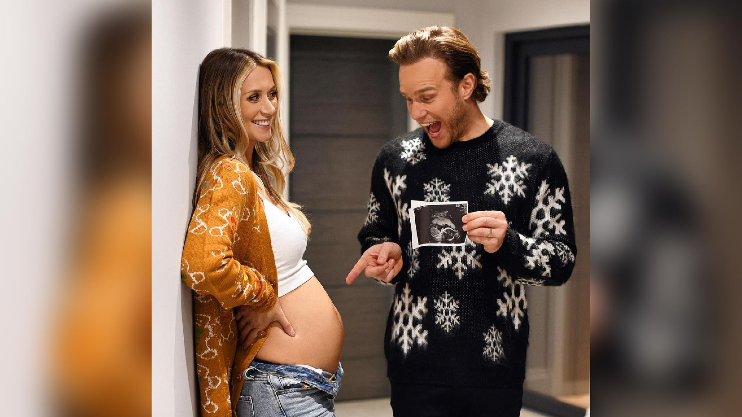 Der Popstar Olly Murs und seine Frau mit Babybauch