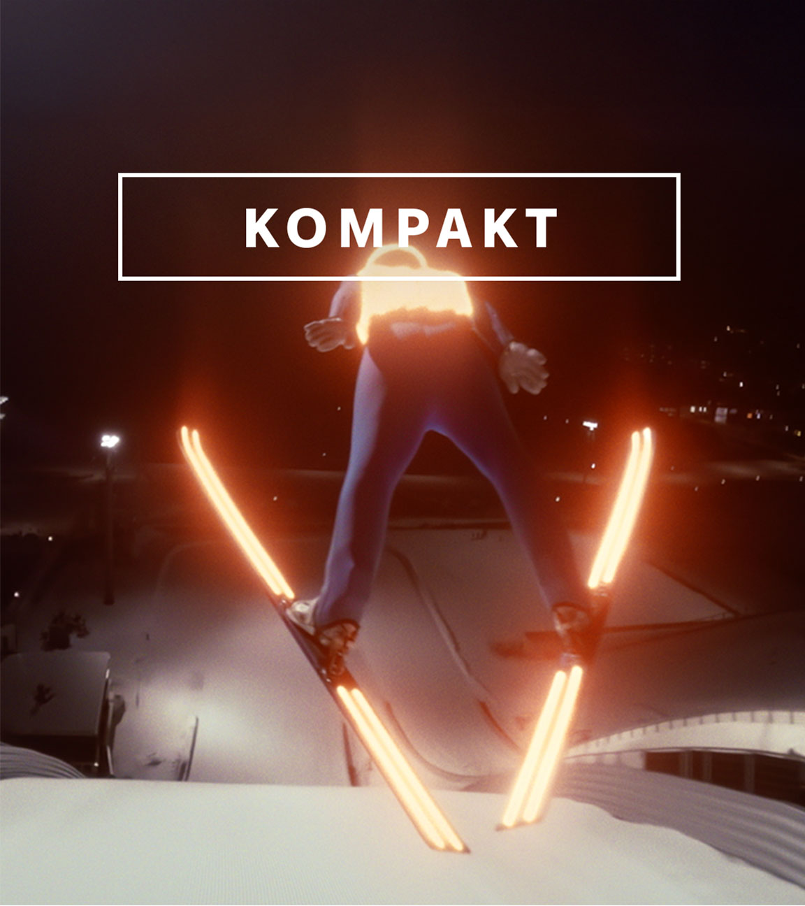 Das Wintersport "KOMPAKT"- Logo vor Skispringer springt von der Schanze
